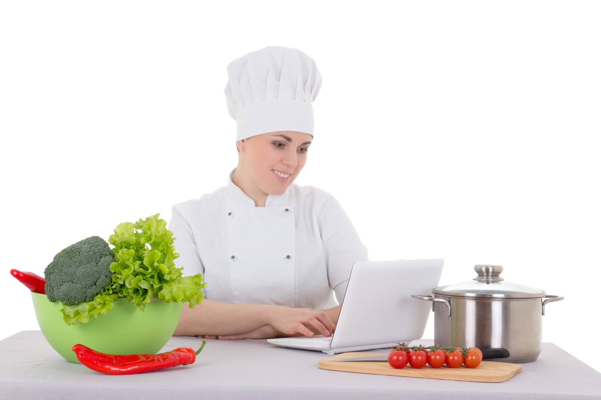 Chef che insegna online in una cucina luminosa